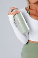 HER insulated 1 litre drink bottle in pistachio, featuring a matte finish, straw lid and stainless steel insulated design