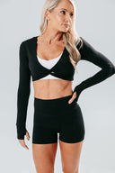 perform black bolero long sleeve active top with thumbholes styled layered over crop