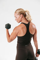 strong woman wearing cocoa activewear set