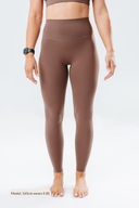 Front view of the Elevate Leggings in mocha, featuring an ultra-high waistband and no front seam design