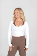 Women’s active long sleeve top with scoop neckline for training front view - white