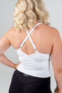 Adjustable cross-back women’s active tank in white – back view
