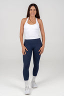 Inspire Tank in White – women’s adjustable cross-back active tank styled with navy perform leggings