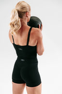 Perform Contour Tank in Onyx styled with matching women’s activewear set