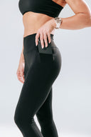 Women’s active leggings with deep side pockets in black – side view