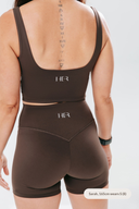 square scoop back detail of perform tank in cocoa