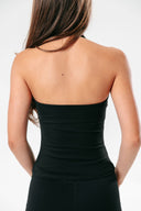 Back view of the Perform Sculpt Halter Tank in Onyx, highlighting the open-back halter silhouette and perform fabric