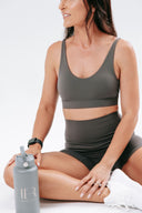 Front view of the Elevate Shorts in stone, highlighting the high-waisted silhouette, soft brushed fabric and no front seam